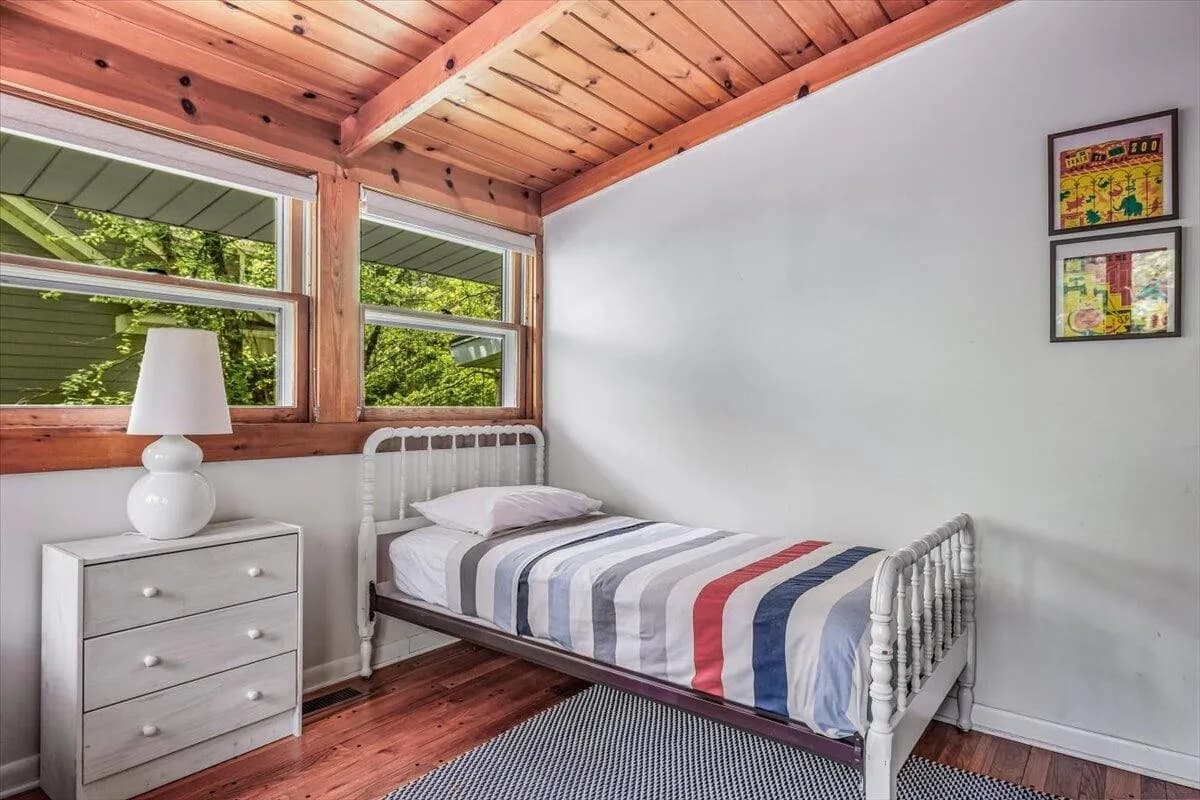 Bedroom with Wood Paneling
