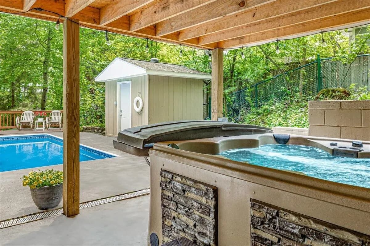 Hot Tub & Pool Area with Pool House