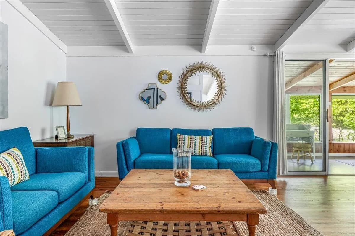 Living Room with Blue Sofas & Wood Coffee Table