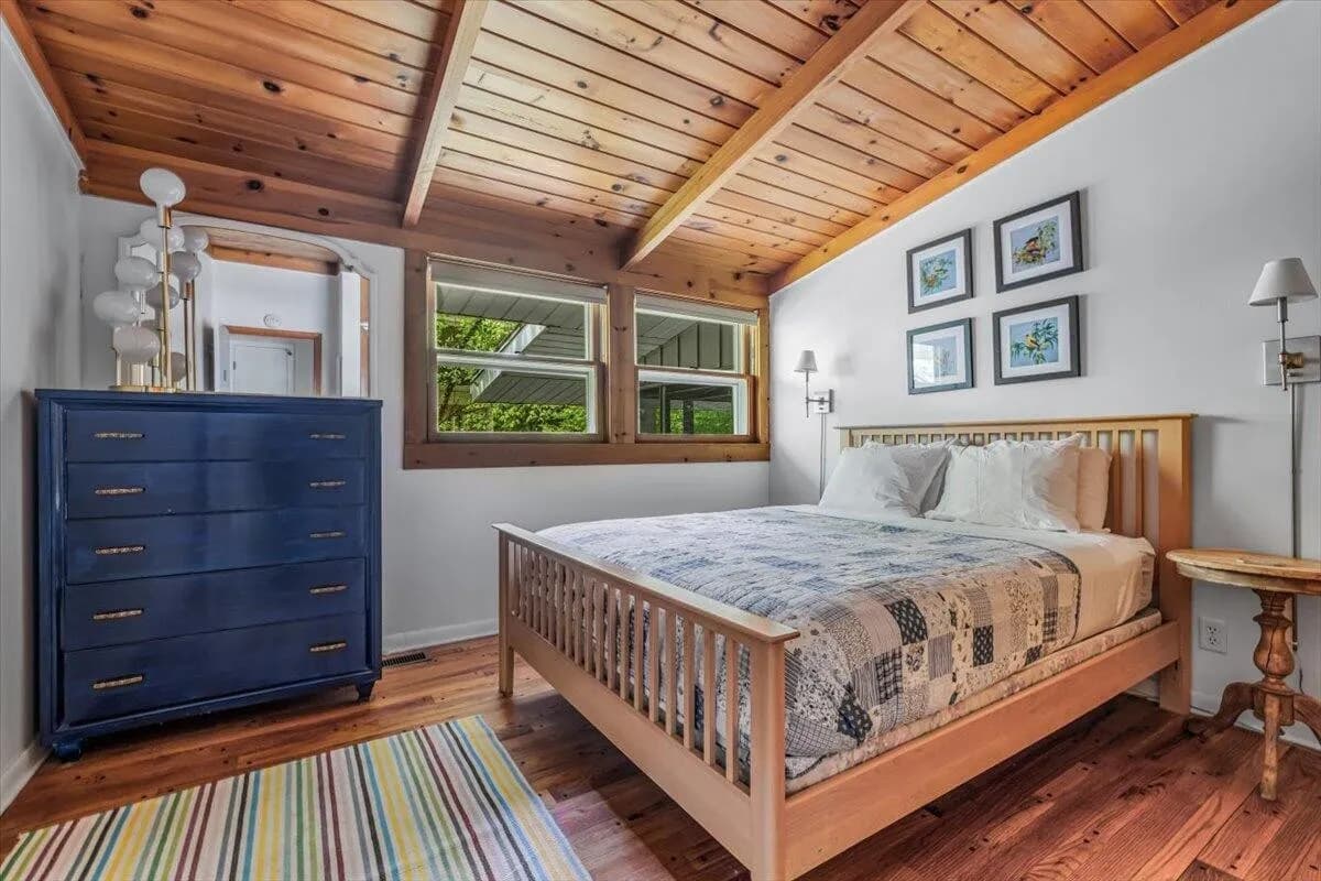 Master Bedroom with Blue Dresser & Wood Ceiling