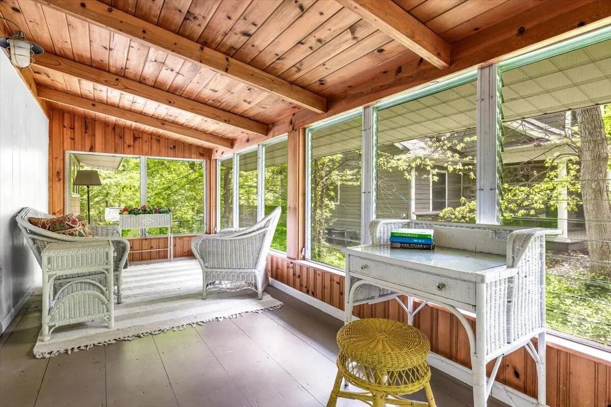 Sunroom with Wicker Chairs and Desk
